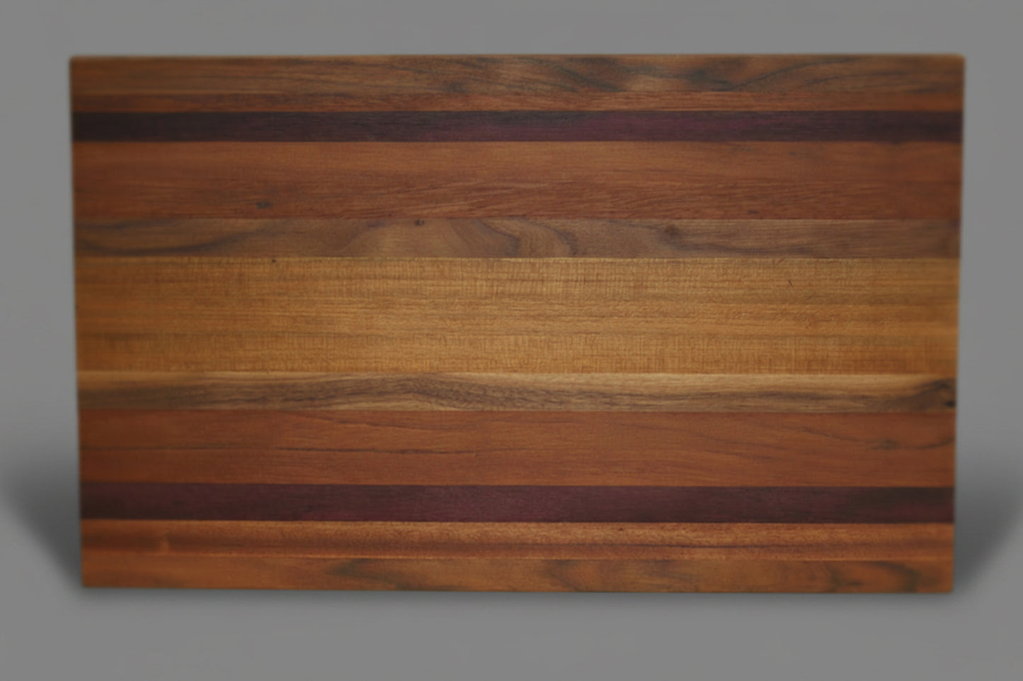 Mixed Hardwood Cutting Board – Padauk, Yellowheart, Purpleheart & Walnut
